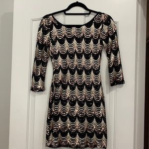 Gold and black sequence cocktail dress.